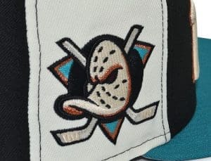 Anaheim Ducks Black Chrome Teal 59Fifty Fitted Hat by NHL x New Era Side Anaheim Ducks Black Chrome Teal 59Fifty Fitted Hat by NHL x New Era Side