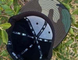 Camo Wordmark 59Fifty Fitted Hat by Dionic x New Era Bottom Camo Wordmark 59Fifty Fitted Hat by Dionic x New Era Bottom
